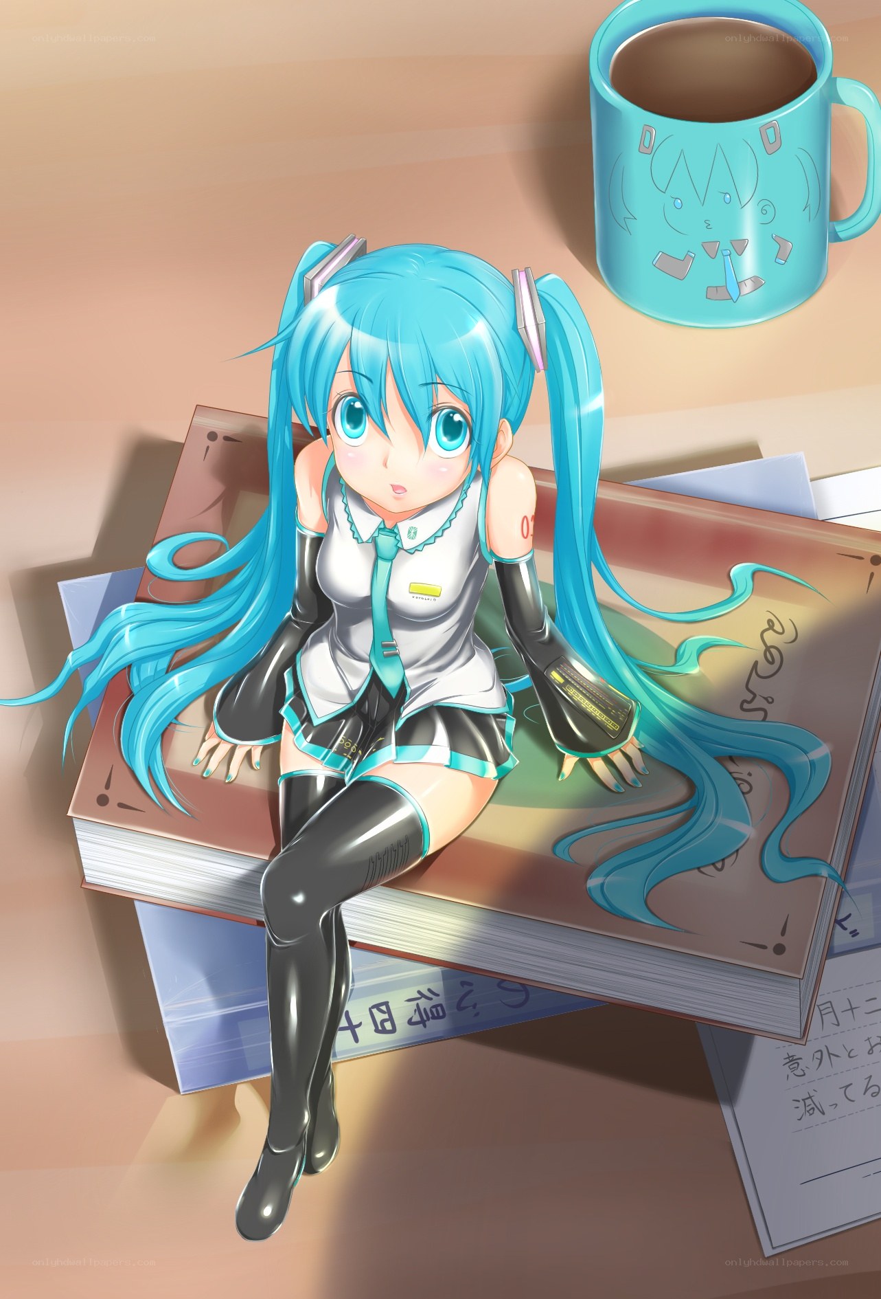 Miku sitting on books
