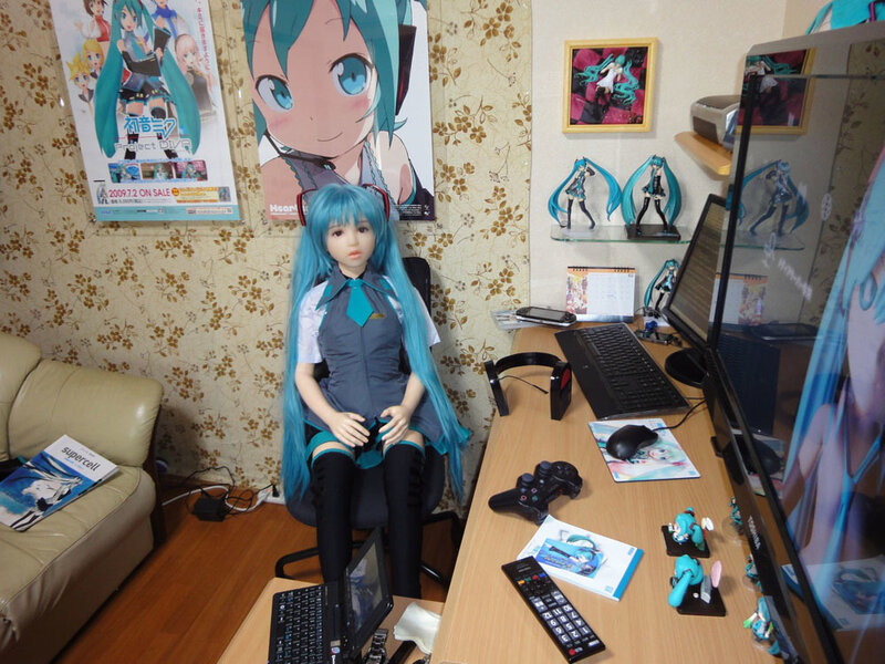 Miku-themed room with doll and merchandise