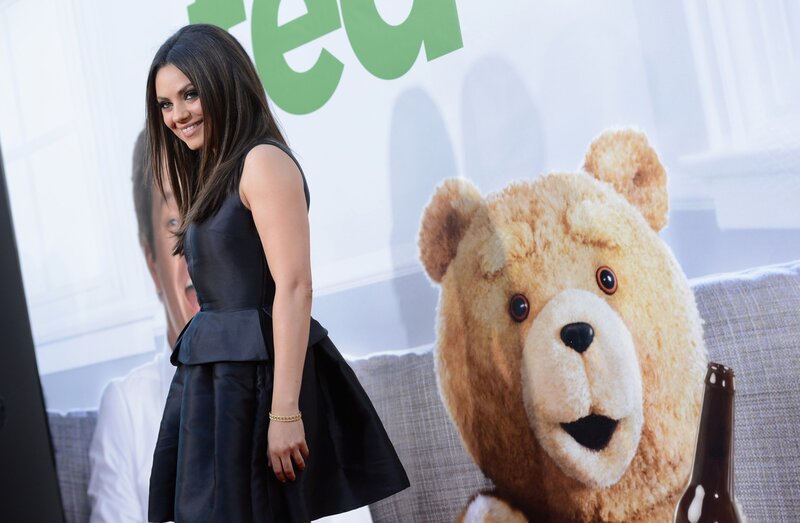 Mila Kunis at a movie premiere