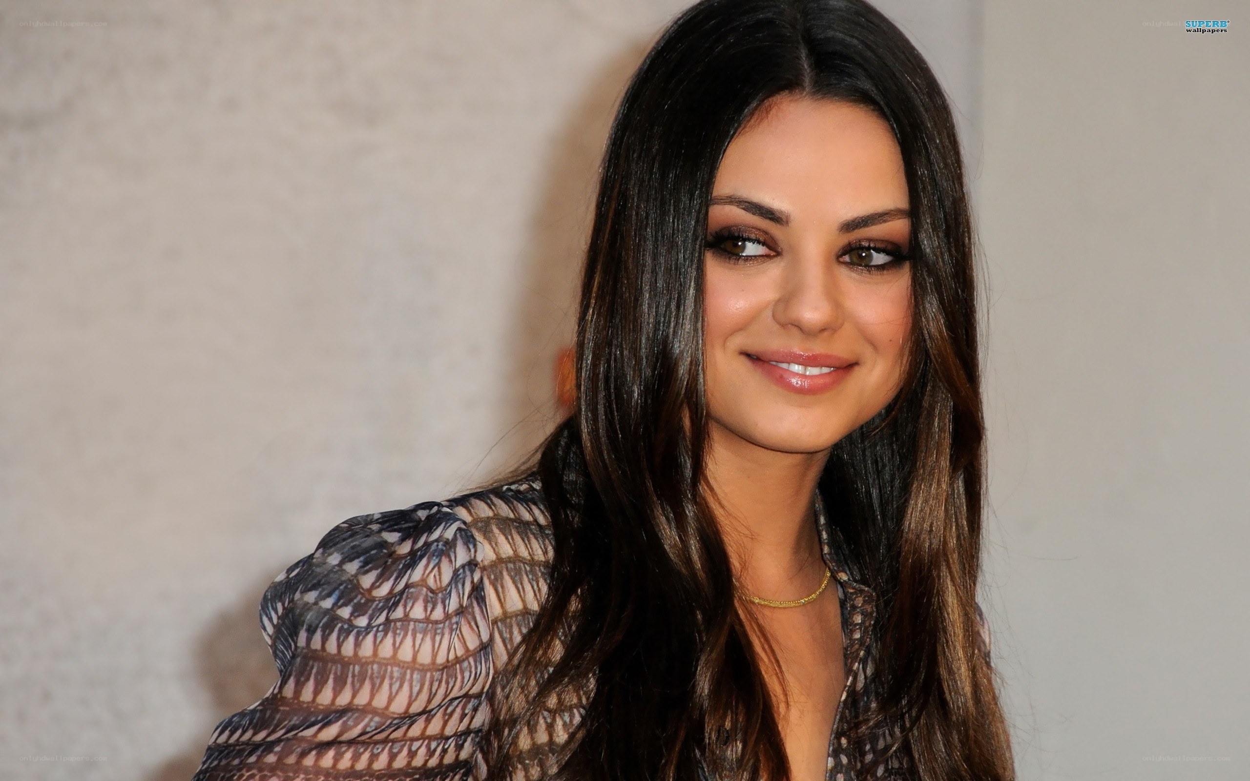 Mila Kunis at an event