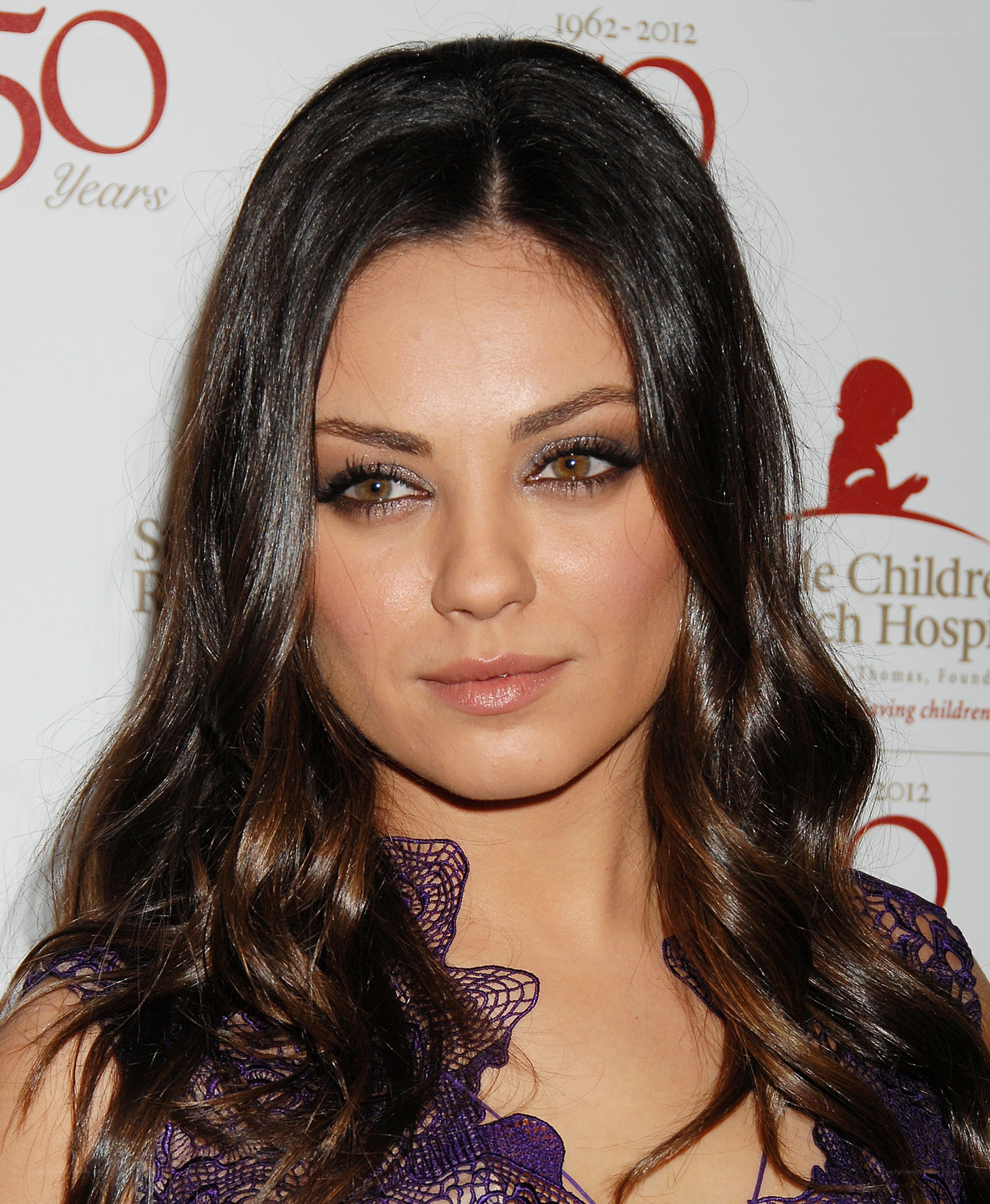 Mila Kunis at event