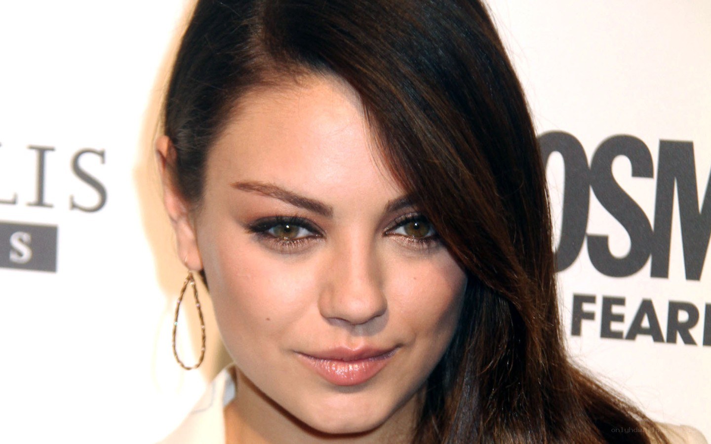 Mila Kunis at event