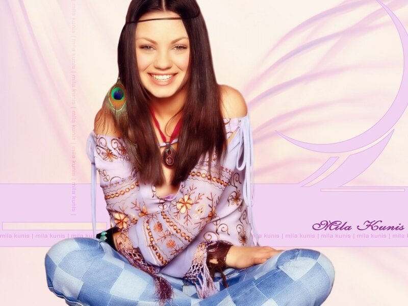 Mila Kunis in purple top