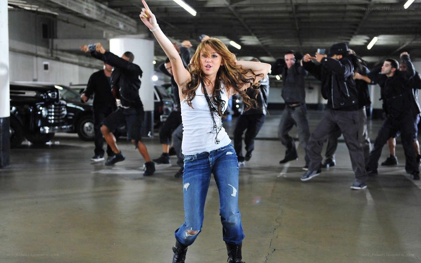 Miley Cyrus dancing in parking garage