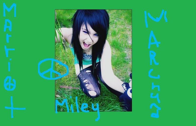 Miley Cyrus in grass