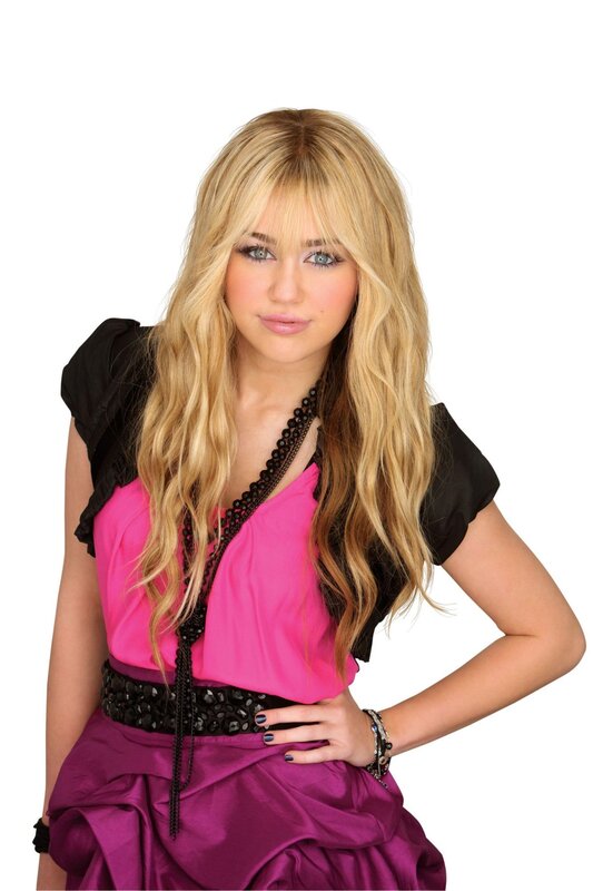Miley Cyrus in pink and purple outfit