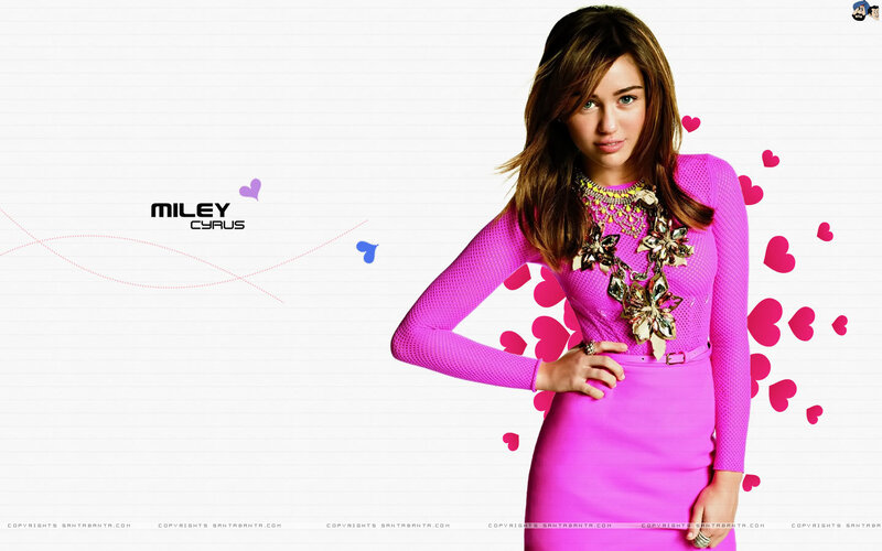 Miley Cyrus in pink dress