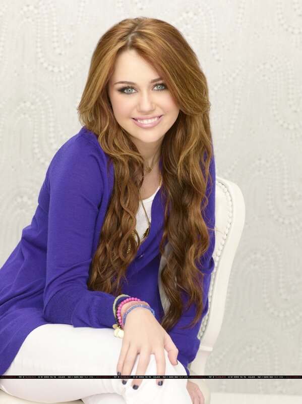 Miley Cyrus in purple cardigan