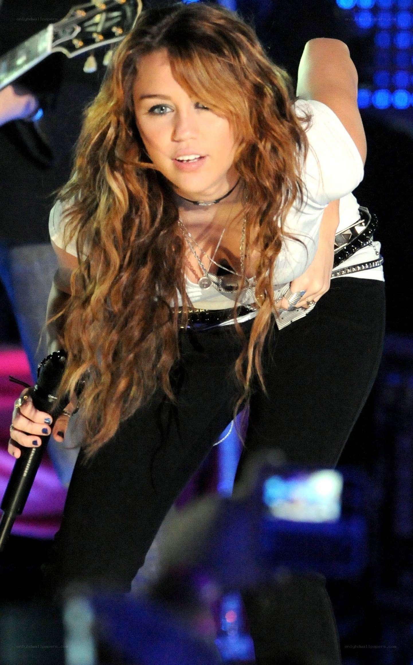 Miley Cyrus performing on stage
