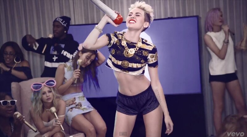 Miley Cyrus performs in music video