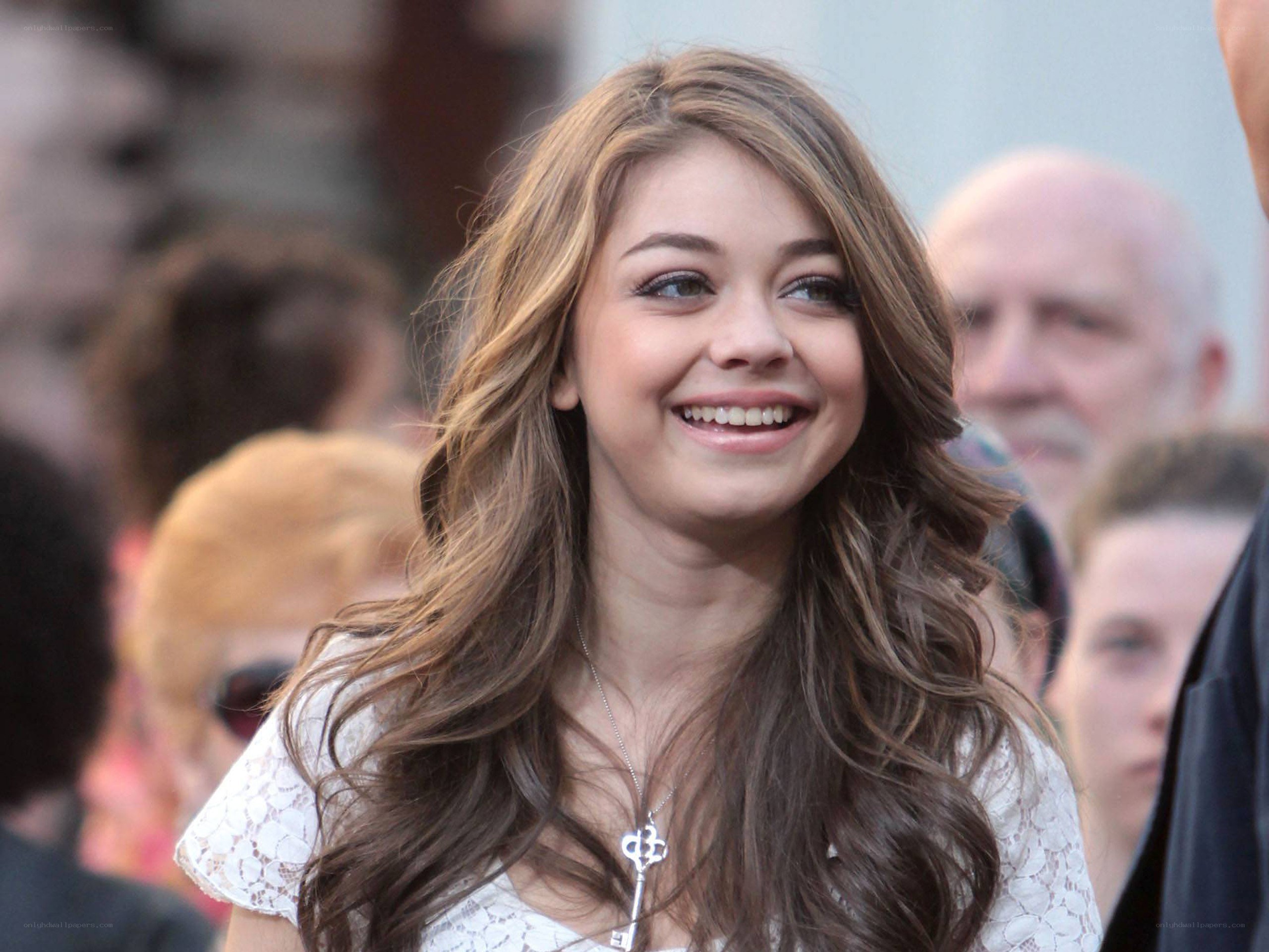 Miley Cyrus smiling at event