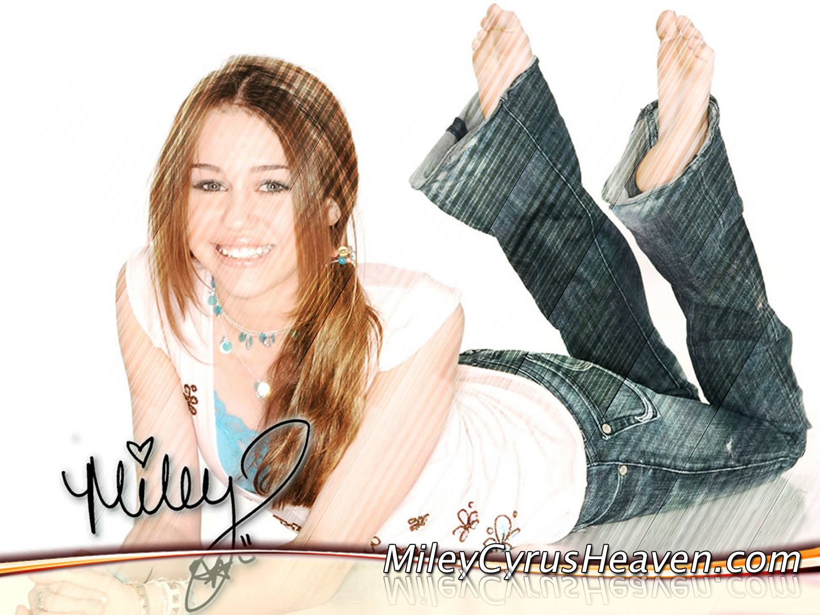 Miley Cyrus smiling on white