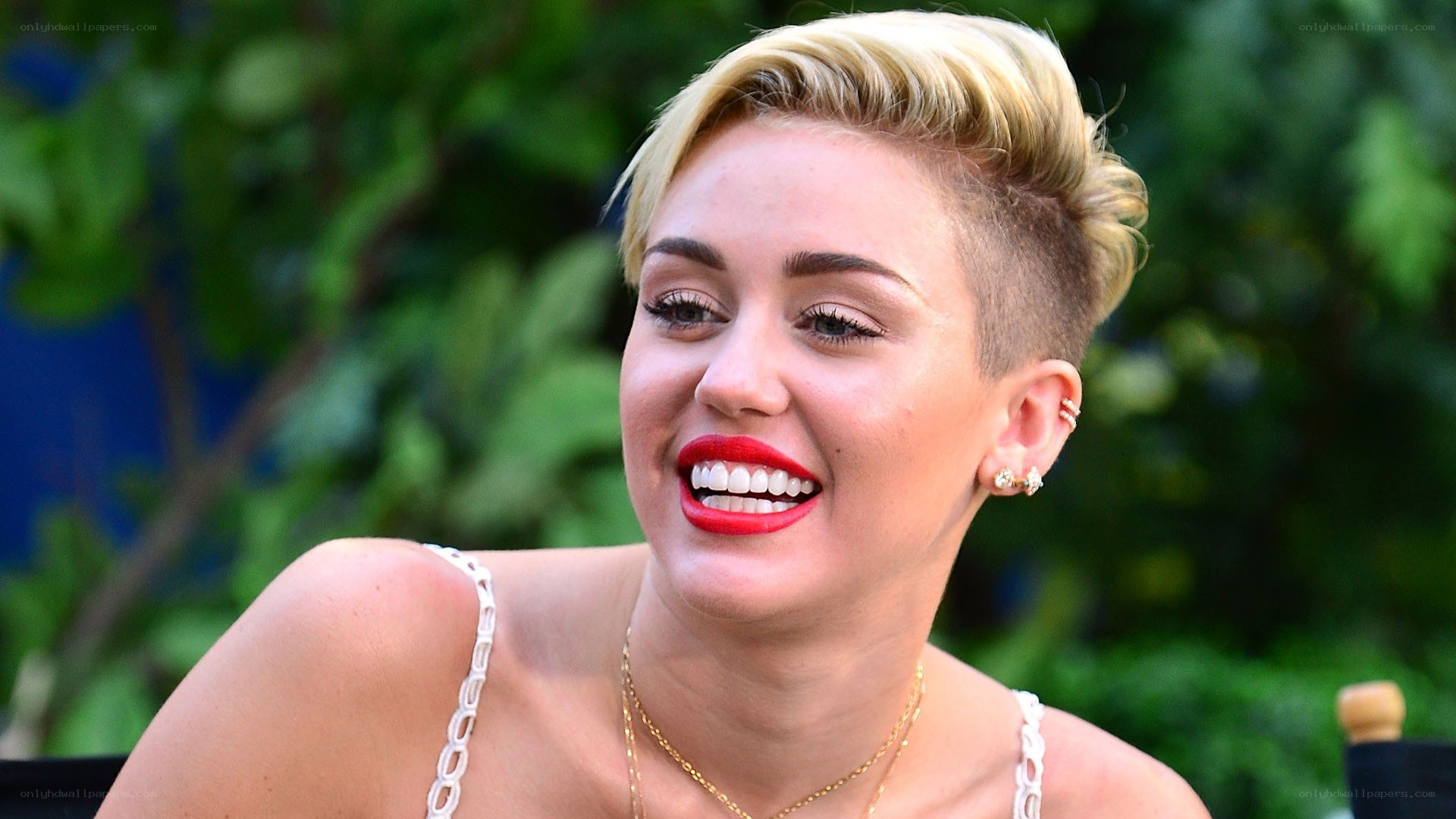 Miley Cyrus smiling outdoors