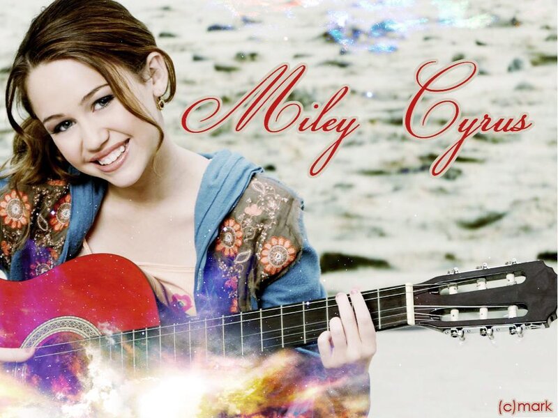 Miley Cyrus with guitar