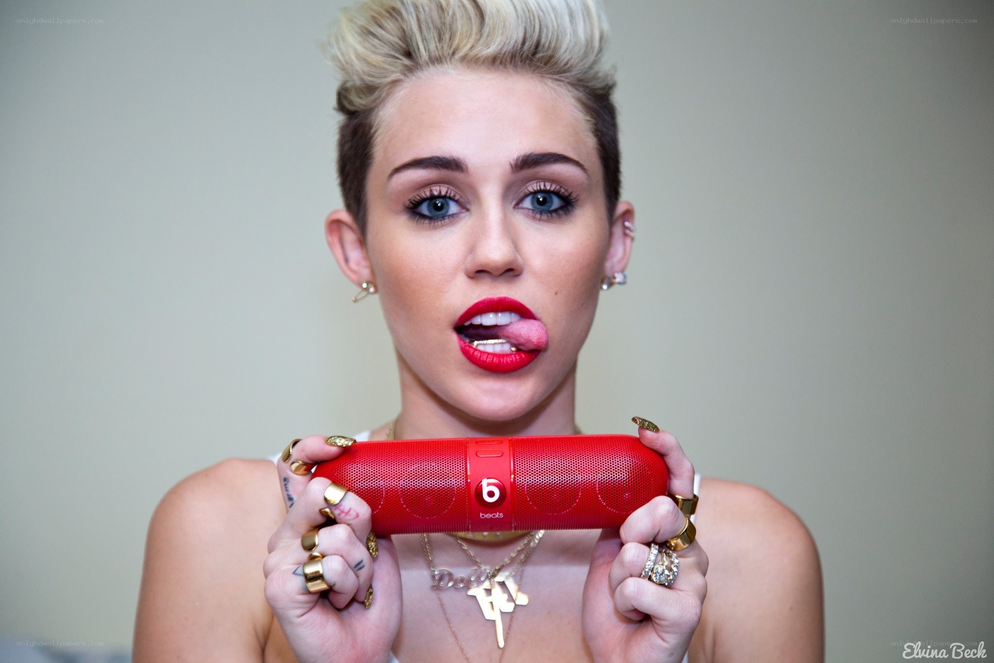 Miley Cyrus with red speaker