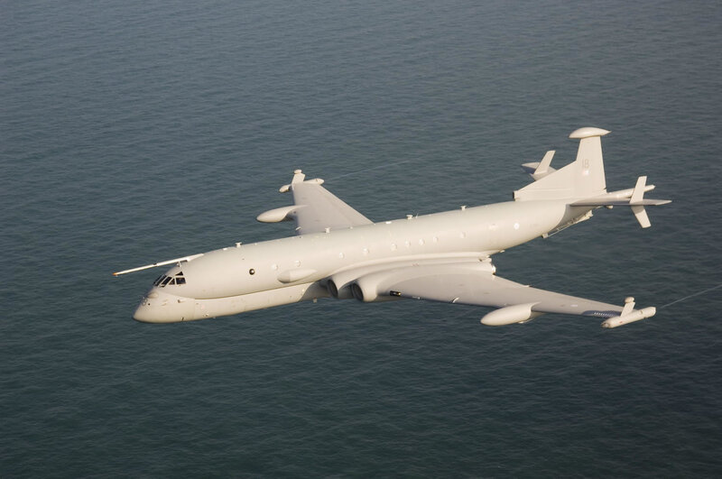 military aircraft flying over sea