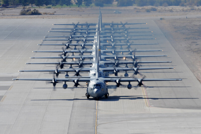 Military aircraft formation on runway