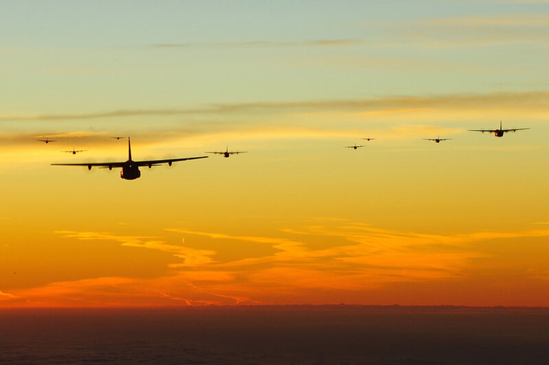 Military Aircraft Formation — Orange