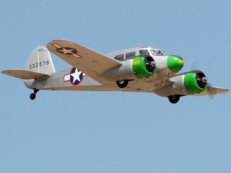 Military Aircraft in Flight — Blue, Calm