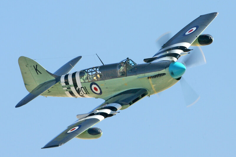 Military Aircraft in Flight — Blue, Dynamic, Afternoon, Photograph, Propeller