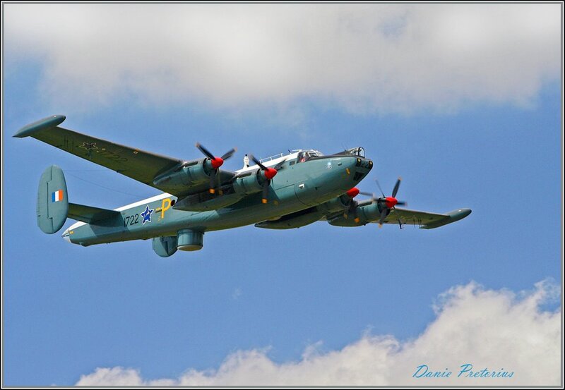 Military Aircraft in Flight — Blue, Dynamic, Afternoon, Photograph, Propellers