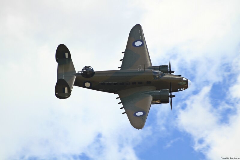 Military Aircraft in Flight — Blue, Dynamic, Afternoon