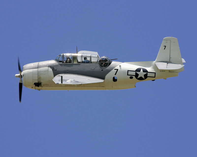 Military Aircraft in Flight — Blue