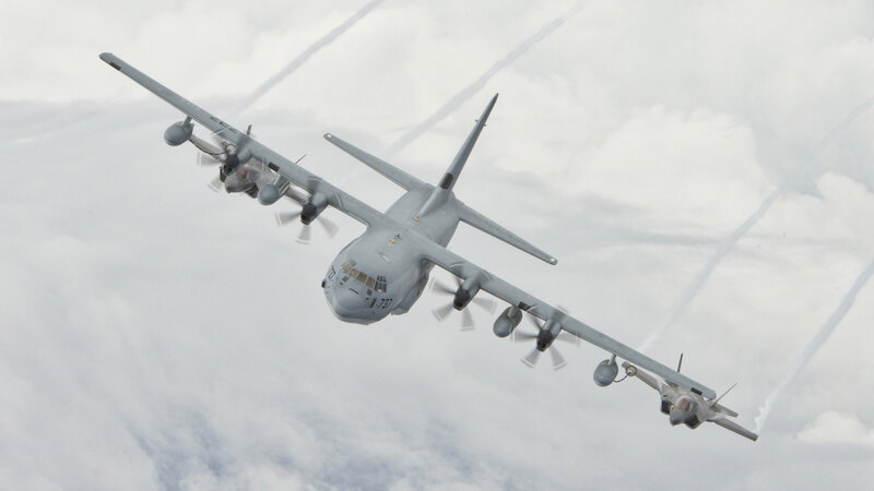 Military Aircraft in Flight — Gray, Dramatic, Photograph, Clouds, Jet Stream