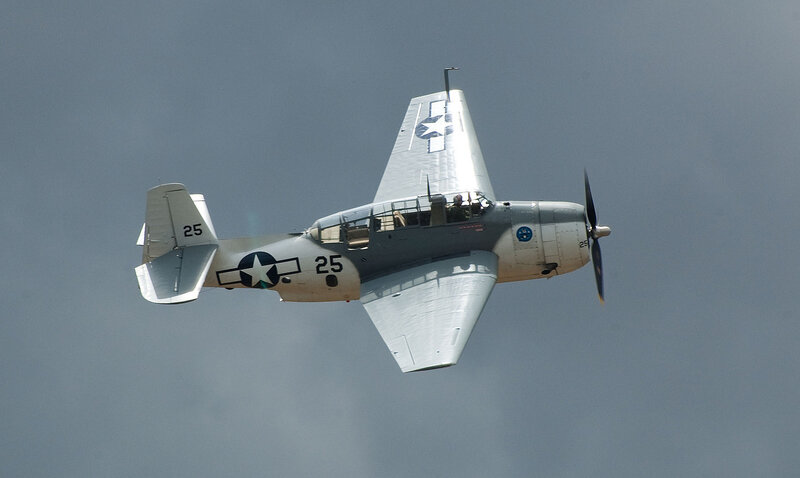 Military Aircraft in Flight — Gray, Dramatic, Photograph, Propeller