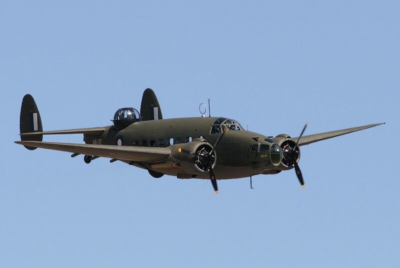 Military Aircraft in Flight — Green, Calm