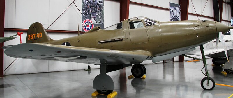 Military Aircraft in Hangar — Olive