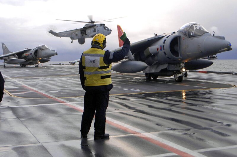 Military aircraft on carrier deck