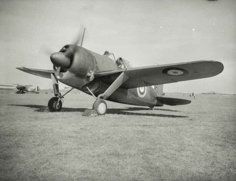 Military Aircraft on Field — Black