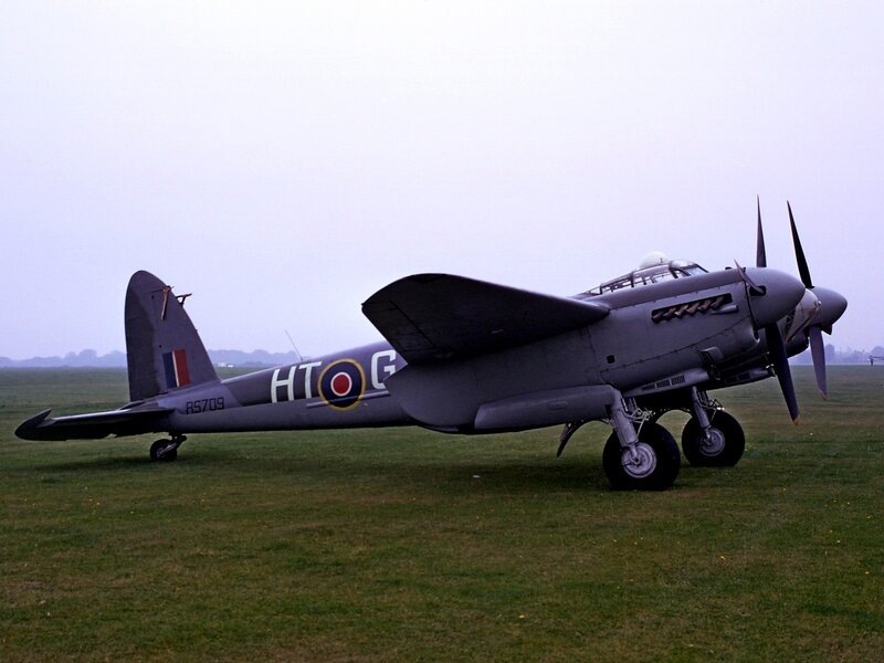 Military Aircraft on Grass — Gray