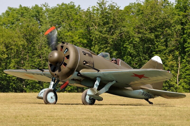 Military Aircraft on Grass — Green, Calm