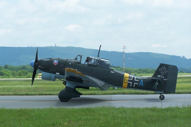 Military Aircraft on Runway — Green, Calm