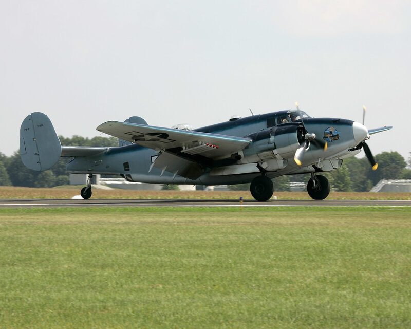 Military Aircraft on Runway — Green