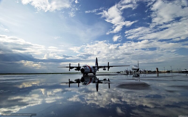 Military Aircraft on Tarmac — Blue, Dramatic, Afternoon