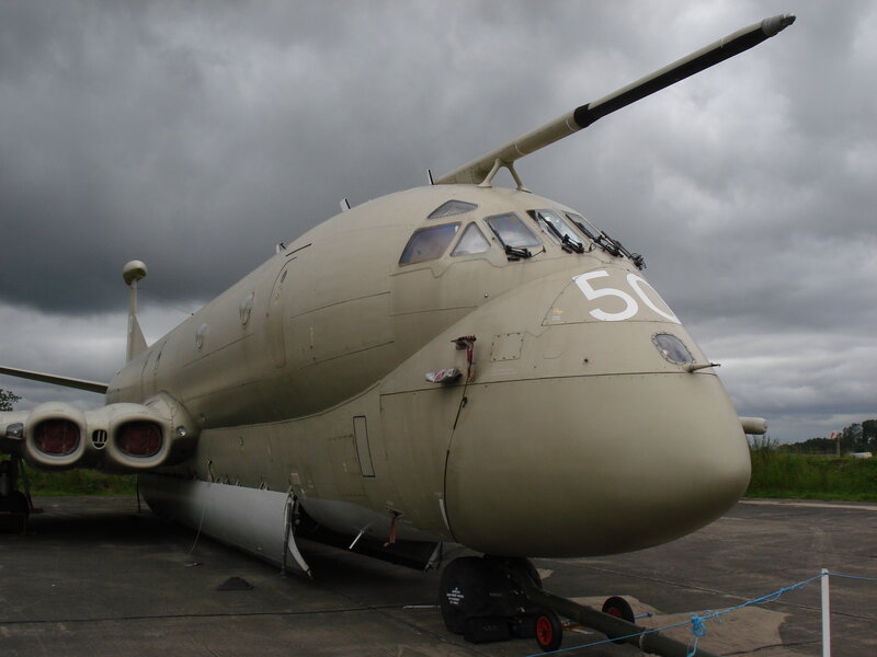Military Aircraft on Tarmac — Gray, Overcast