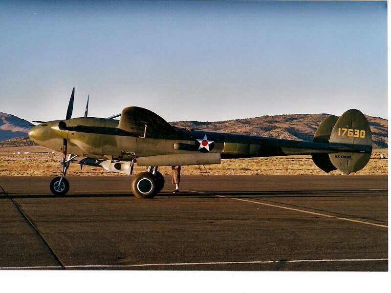 Military Aircraft on Tarmac — Green, Calm, Afternoon, Photograph, Airplane