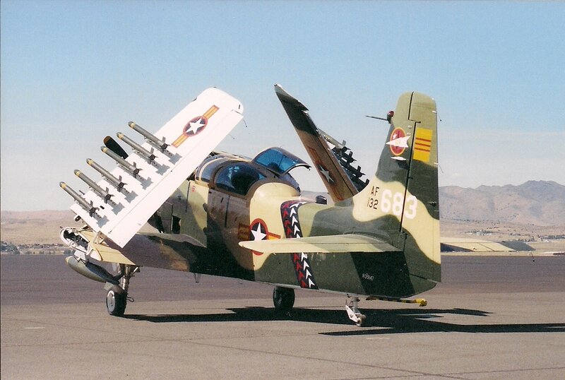 Military Aircraft on Tarmac — Green, Neutral, Afternoon