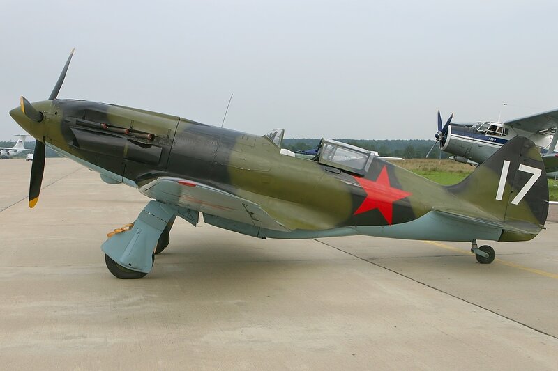Military Aircraft on Tarmac — Green