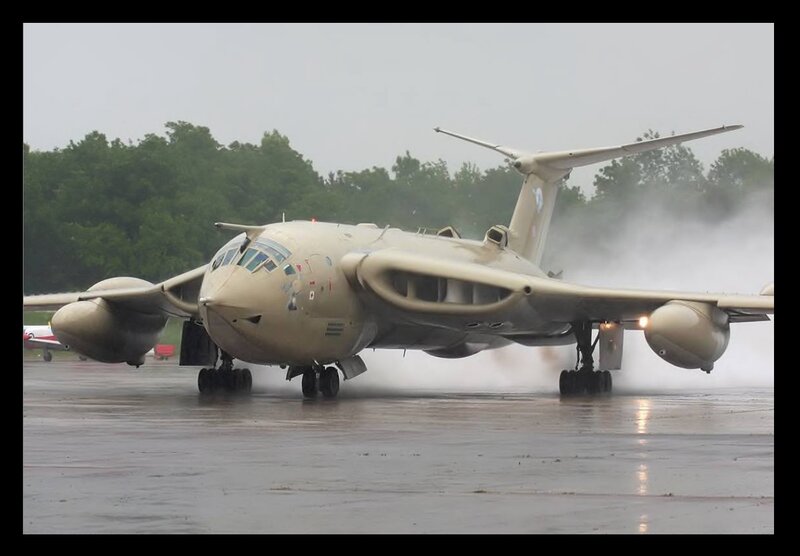 military aircraft on wet runway