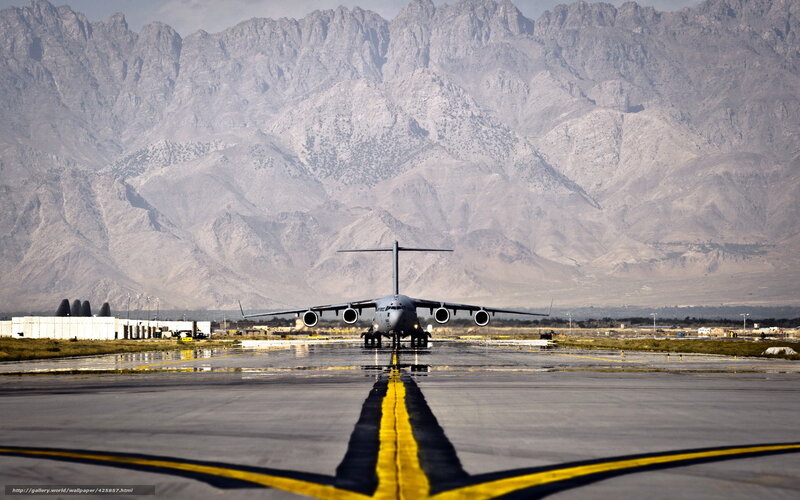 Military aircraft on wet runway