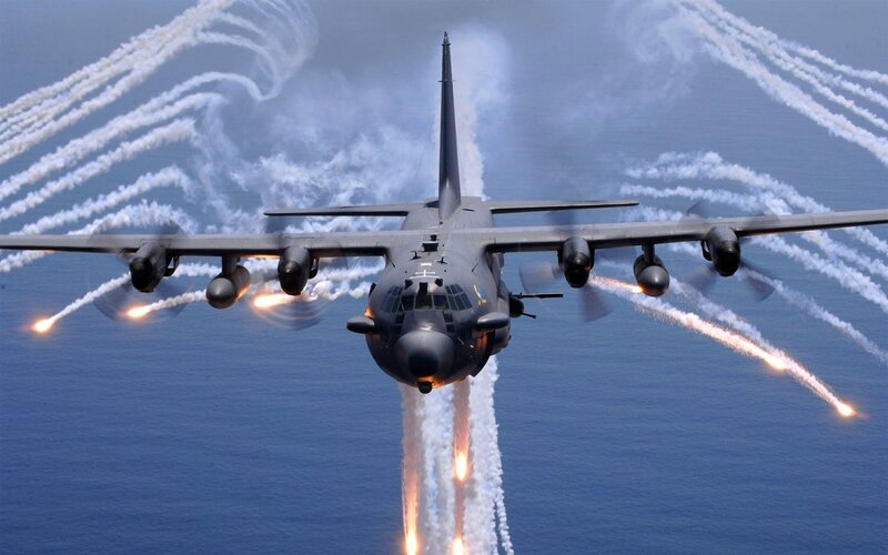 Military aircraft releasing flares