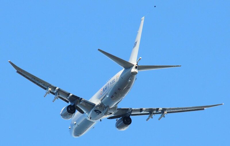 Military Airplane in Flight — Blue, Clear, Afternoon, Photograph, Wings