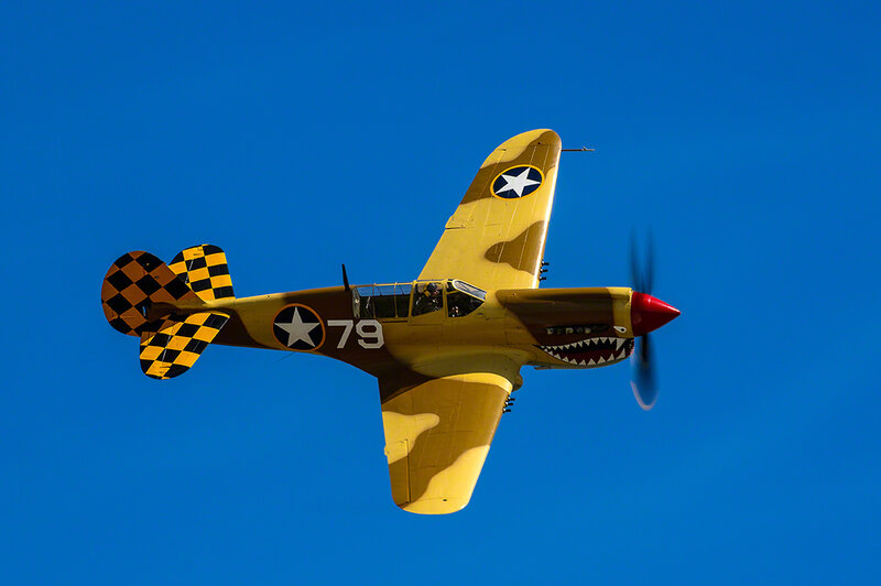 Military Airplane in Flight — Blue, Dynamic, Afternoon, Photograph, Propeller
