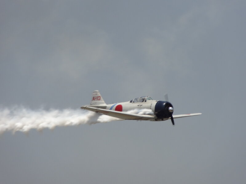 Military Airplane in Flight — Gray, Dynamic, Photograph