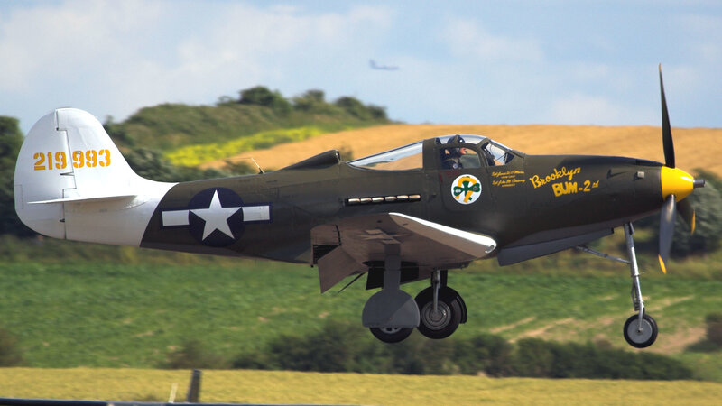 Military Airplane in Flight — Green, Dynamic, Afternoon, Photograph, Propeller, Pilot, Field