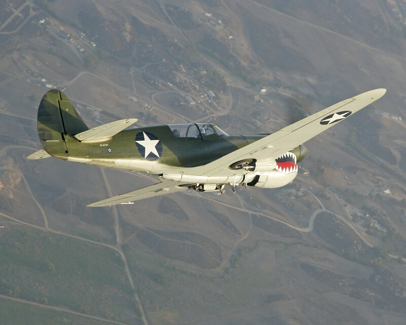 Military Airplane in Flight — Green